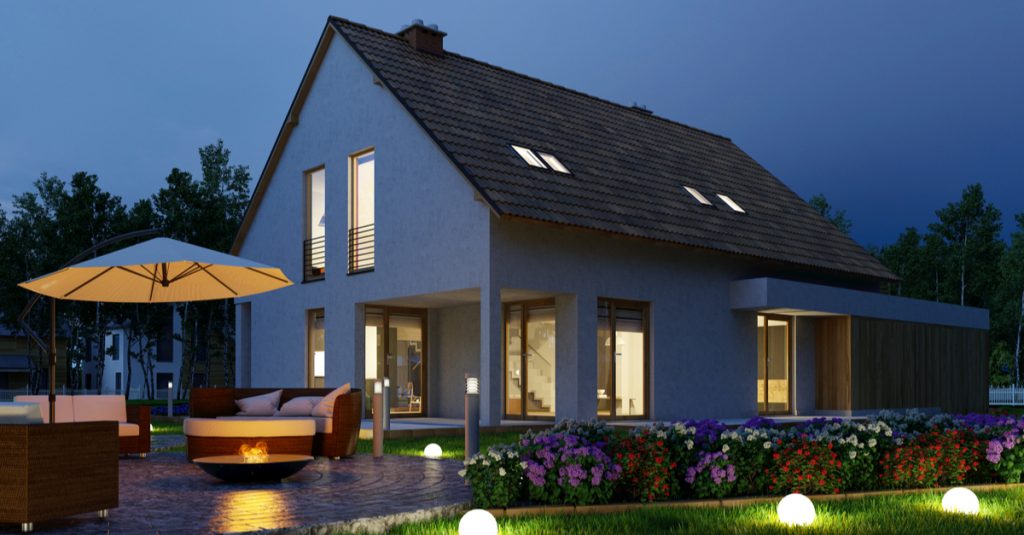 Maison avec éclairage extérieur cosy