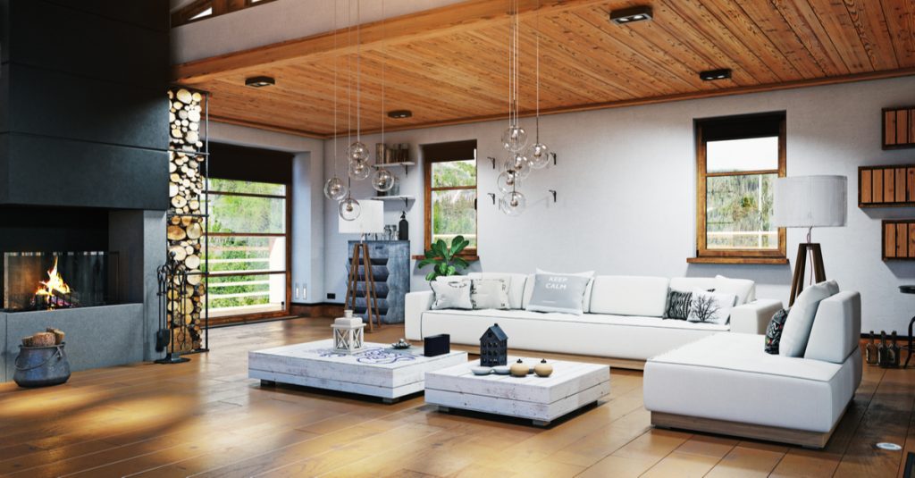 Poêle à bois avec pile de bûche dans intérieur design et spacieux